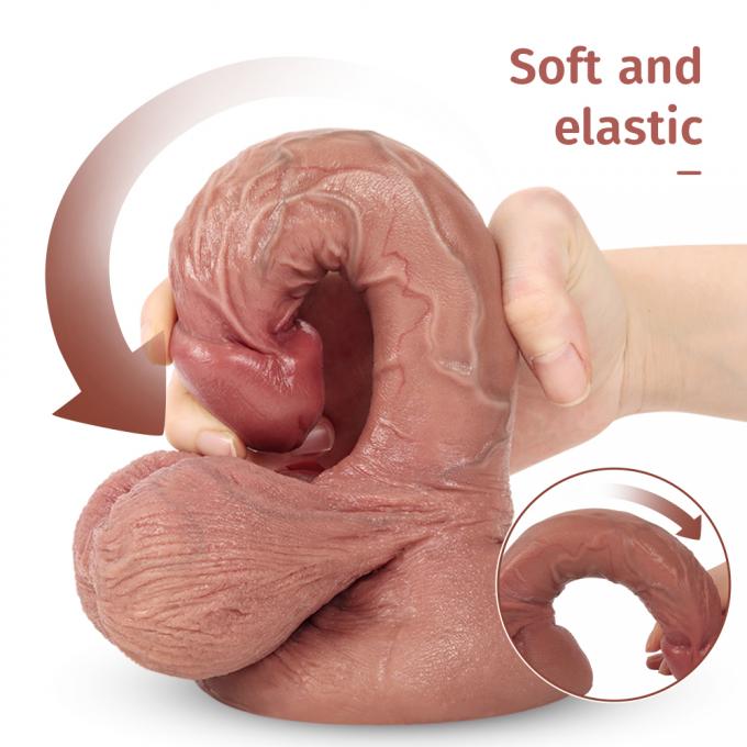 Factory worker inspecting silicone dildo